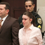 Casey Anthony and Jose Angel Baez standing during the murder trial