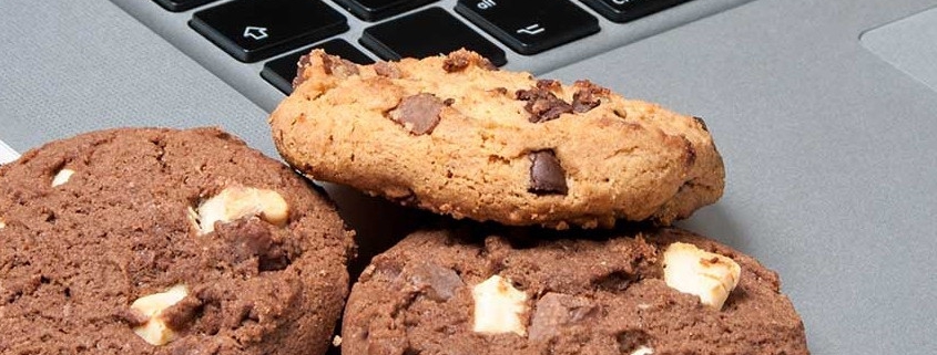 Cookies next to a laptop keyboard