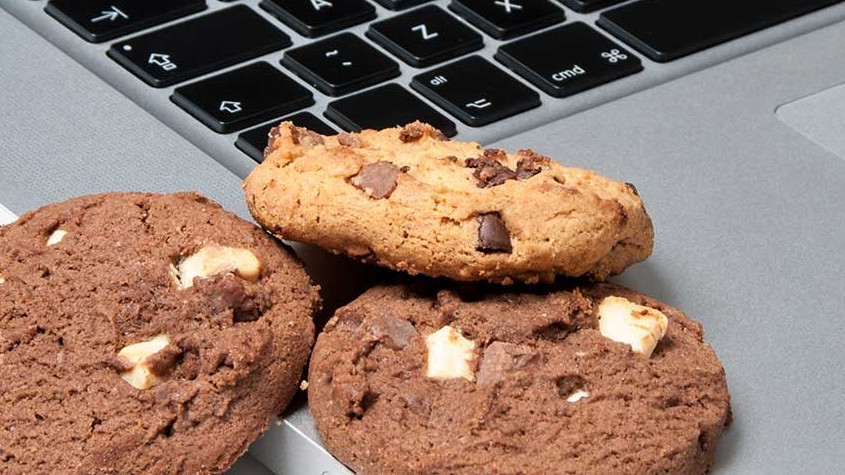 Cookies next to a laptop keyboard