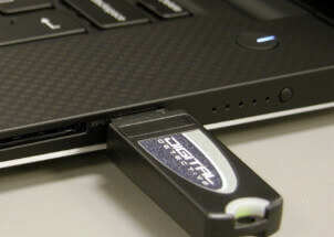 Laptop showing Digital Detective USB dongle