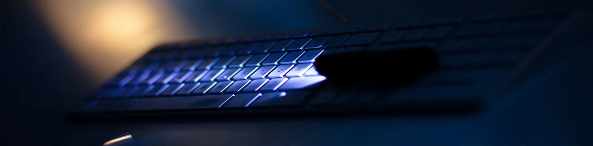 Keyboard being illuminated by a torch